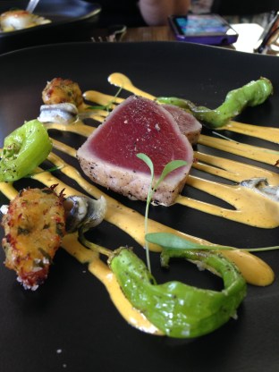 Seared yellow fin tuna, salt cod fritter, Lombardo peppers and saffron dressing