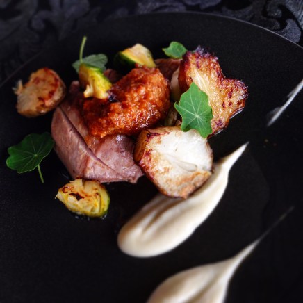 Sous vide pork loin, roasted artichoke, brussel sprout, pork skin crumble