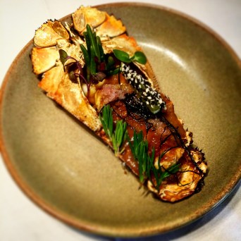 Whole Moreton Bay bug with roasted peanut curry butter, nori and finger limes