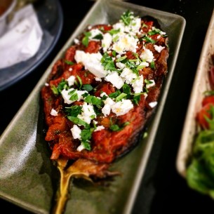 Eggplant pouch with onion, homemade tomato sauce and feta